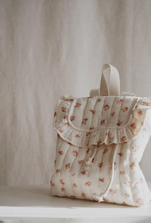 Crème baby rugzak met bloemenprint en rucherand