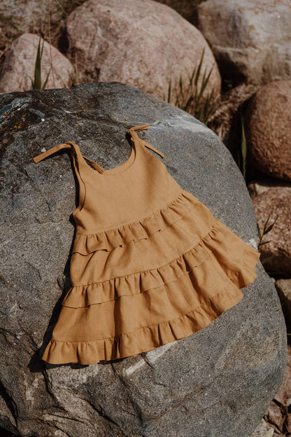 Luchtig zomerjurkje voor meisjes in warme mosterdkleur